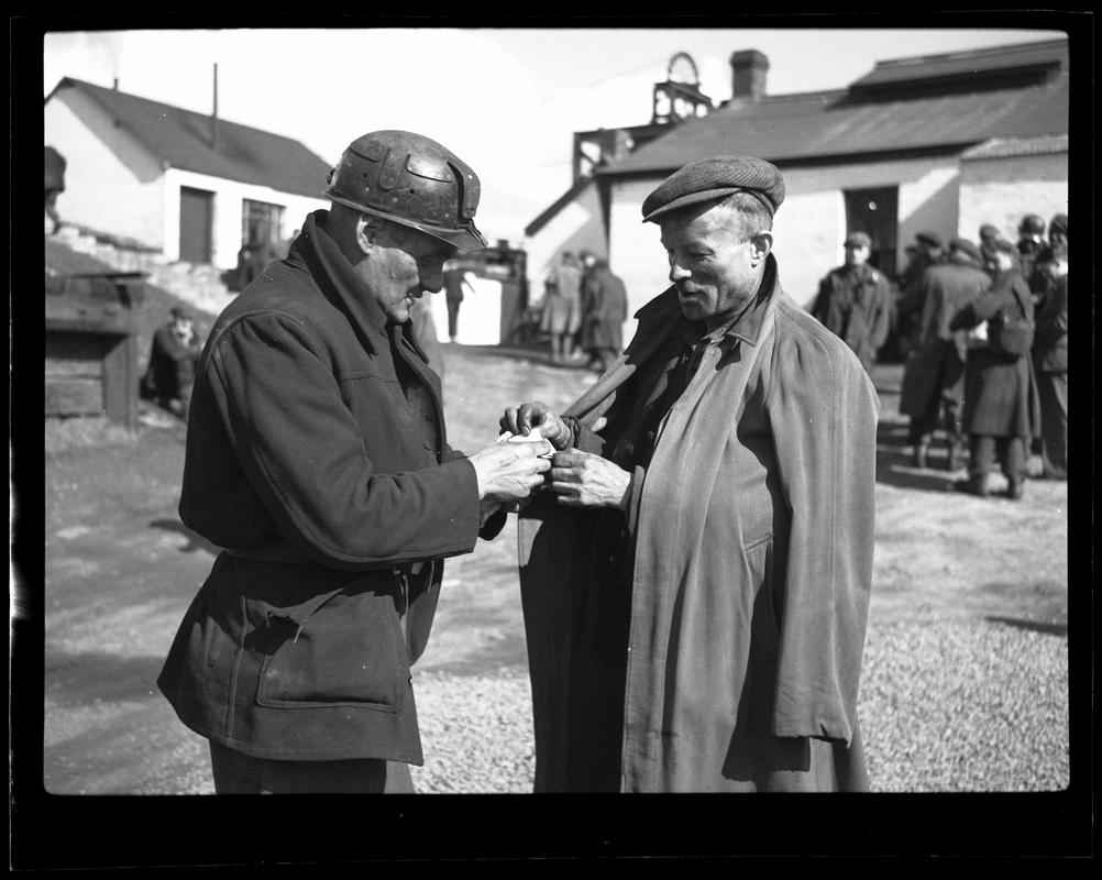 Pay Day - close view of two miners, Ynyscedwyn Colliery