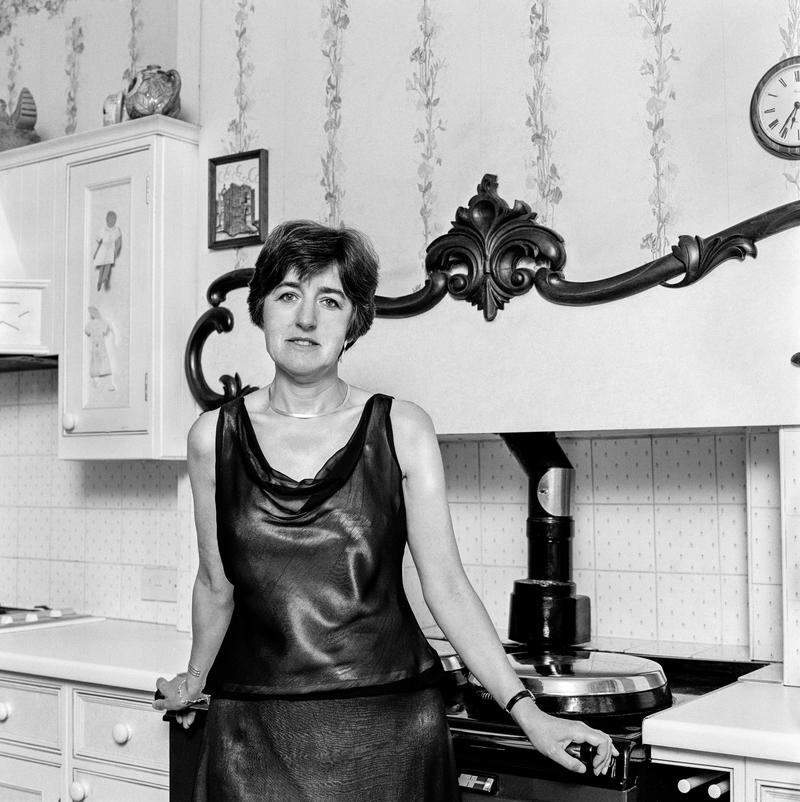 Baroness Ilora Finley. Photo shot: Kitchen of home, Cardiff 9th August 2002. Place and date of birth: London 1949. Main occupation: Professor of Palliative Medicine. First language: English: Other languages: French. Lived in Wales: Over 20 years.