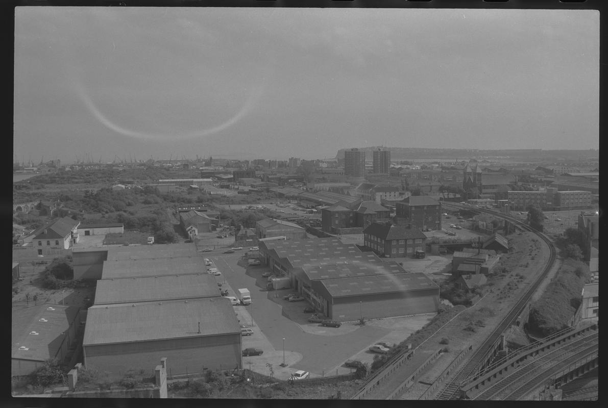 View to south east Butetown with Loudoun Square Flats and Penarth Head in background, and railway lines to Bute Road and Central Station in foreground.