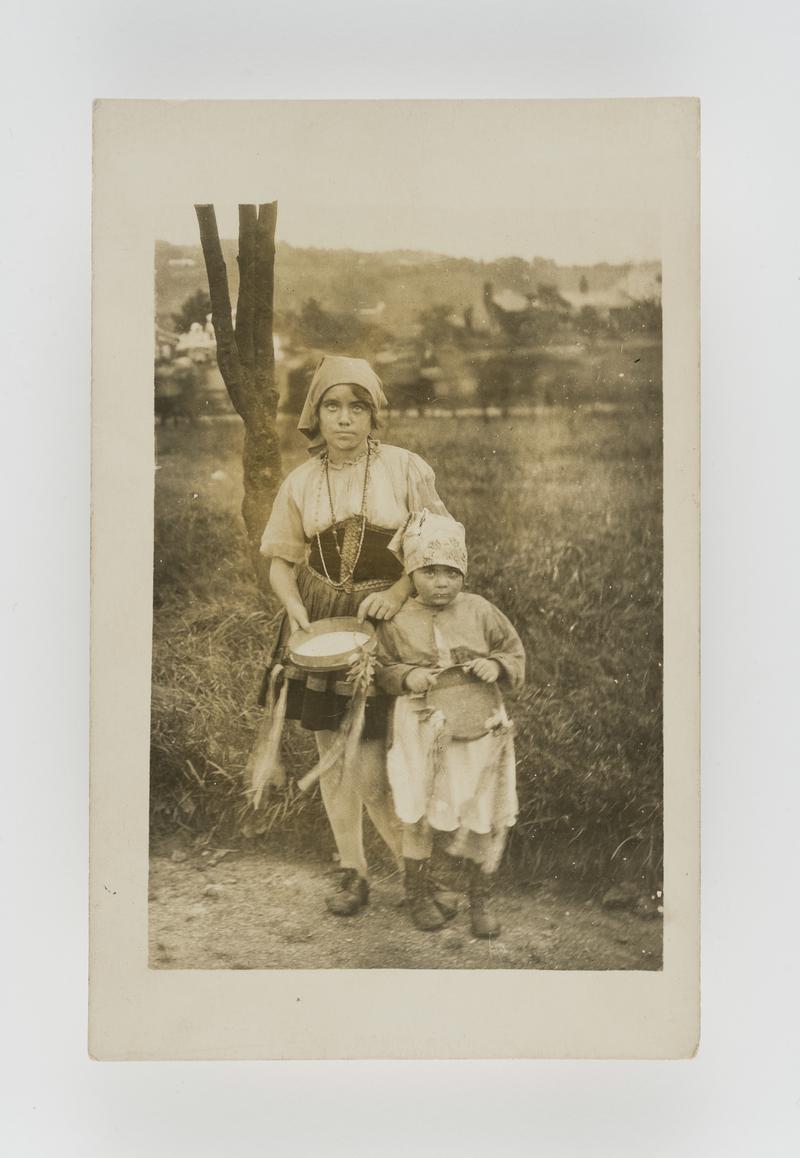 Outdoor photograph of two girls dressed as gypsies.(1920s-1930s?)