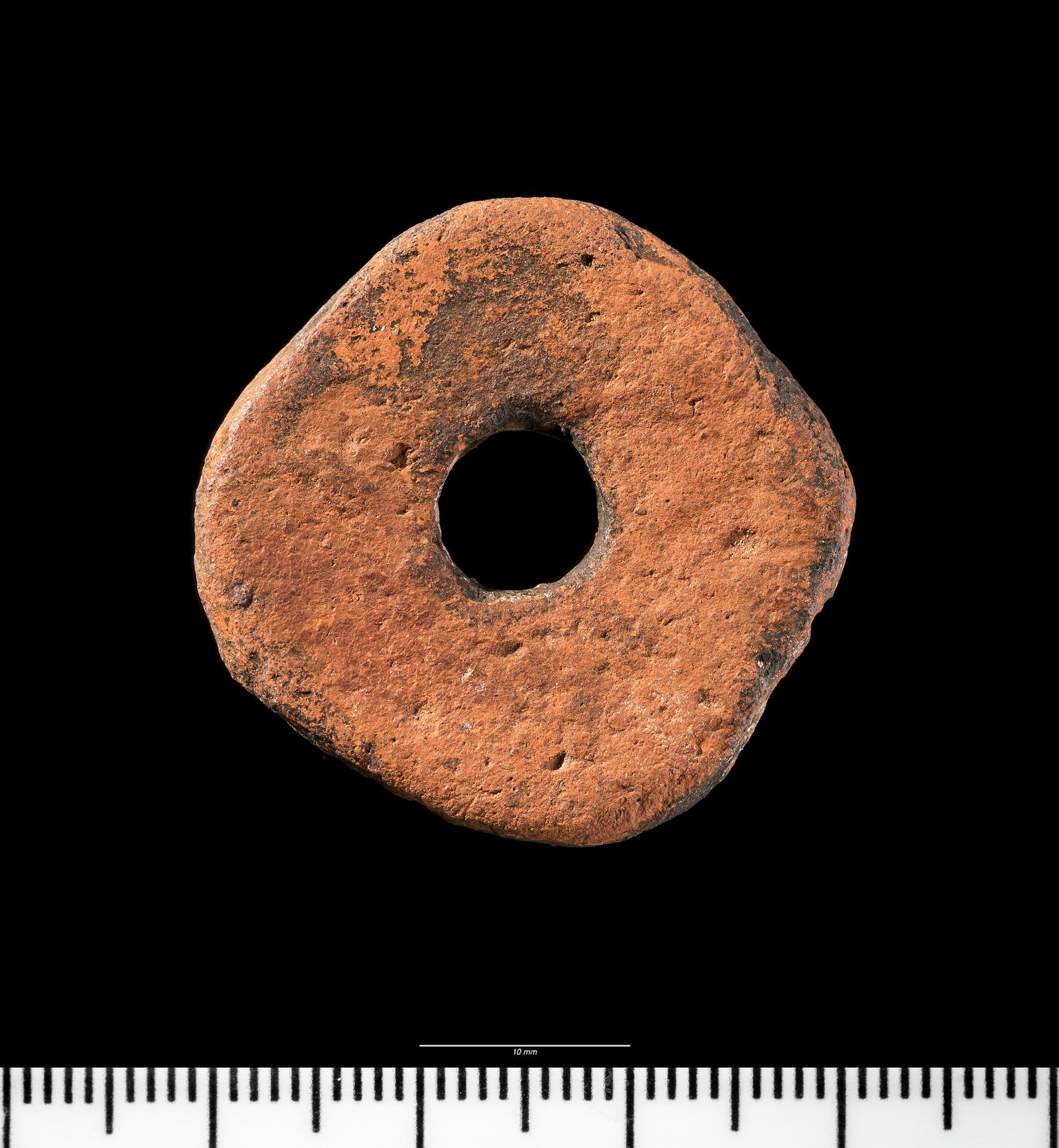 Early Medieval pottery spindle whorl