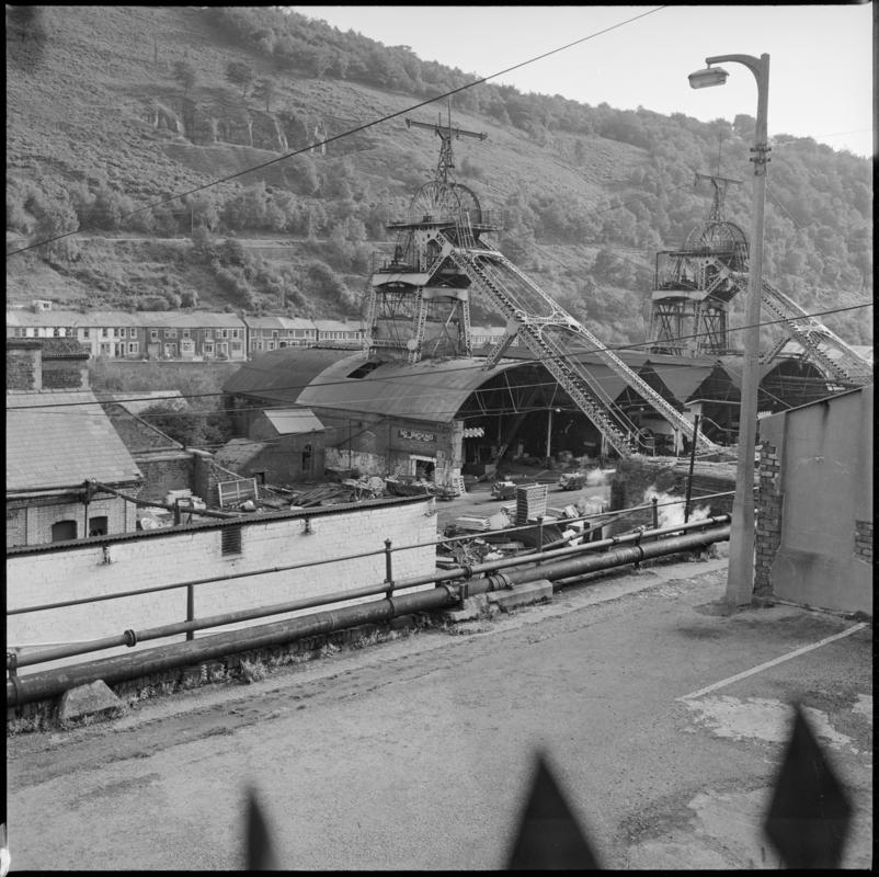 Black and white film negative showing the downcast and upcast headframes, Six Bells Colliery 23 September 1979.  &#039;Six Bells 23 Sept 1975&#039; is transcribed from original negative bag.  Appears to be identical to 2009.3/2914.