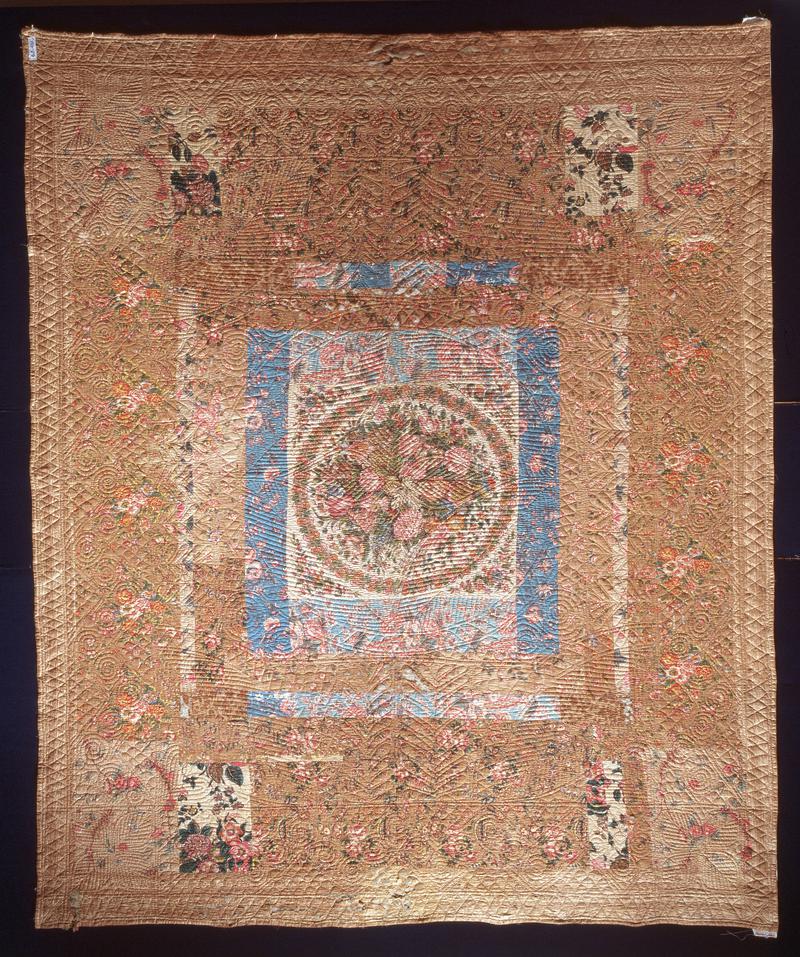 Patchwork quilt, floral cotton prints, from Llandeilo, c. 1800-30