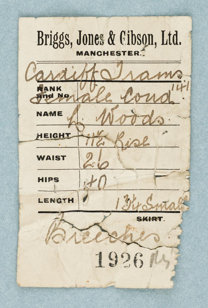Label from a uniform worn by a tram conductress