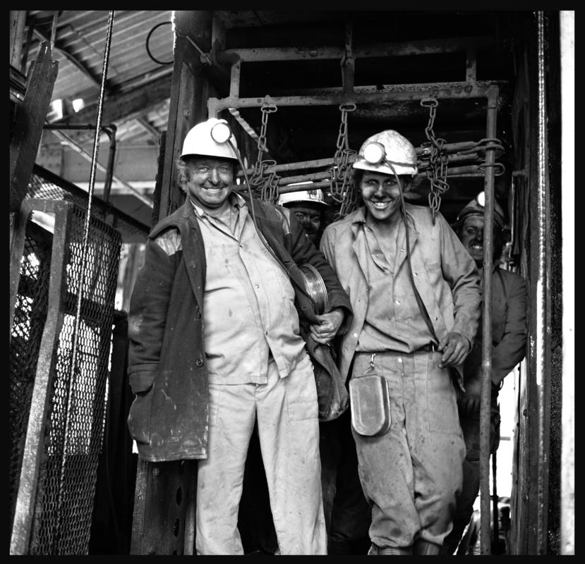 Black and white film negative showing the morning shift arriving on the surface, Merthyr Vale Colliery, 21 September 1981.