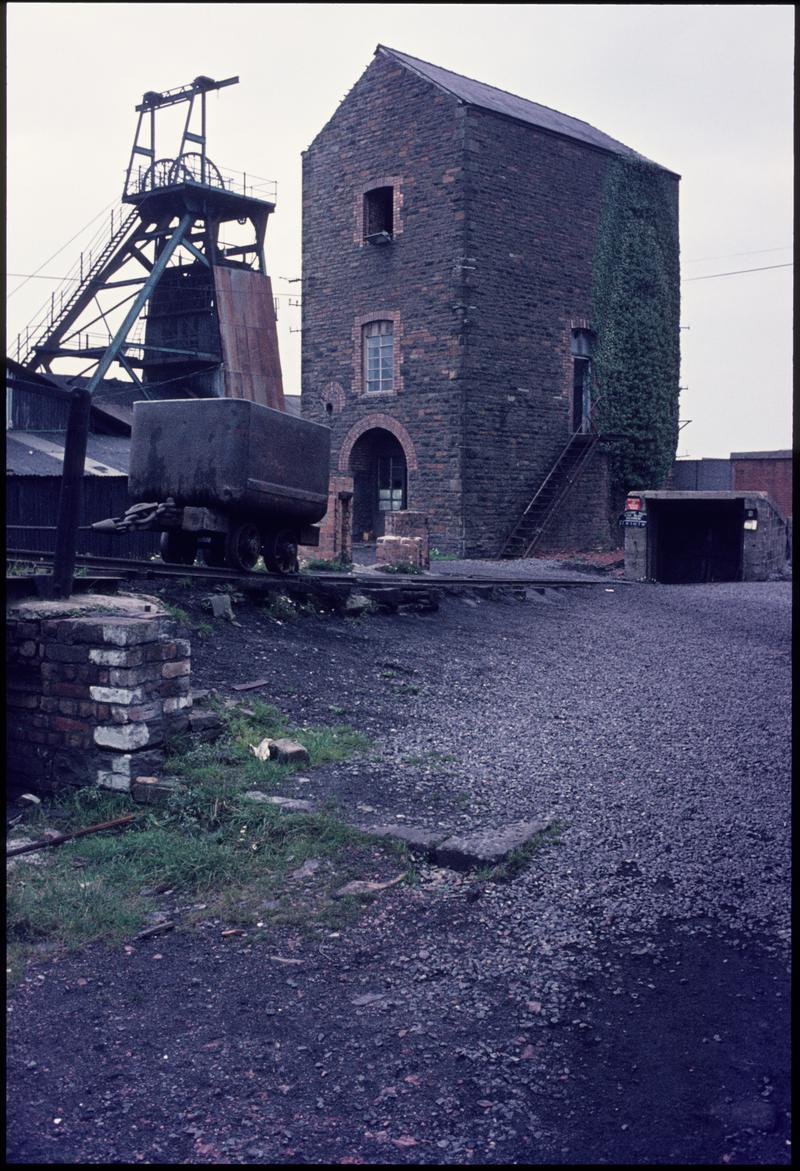 Colour film slide showing the engine house and upcast shaft, Morlais Colliery c.1975.