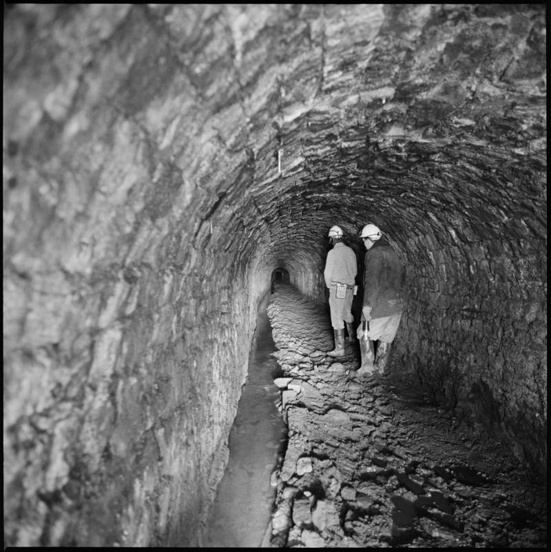 Black and white film negative showing  two men at River Arch, Big Pit Colliery.  Appears to be identical to 2009.3/2990.