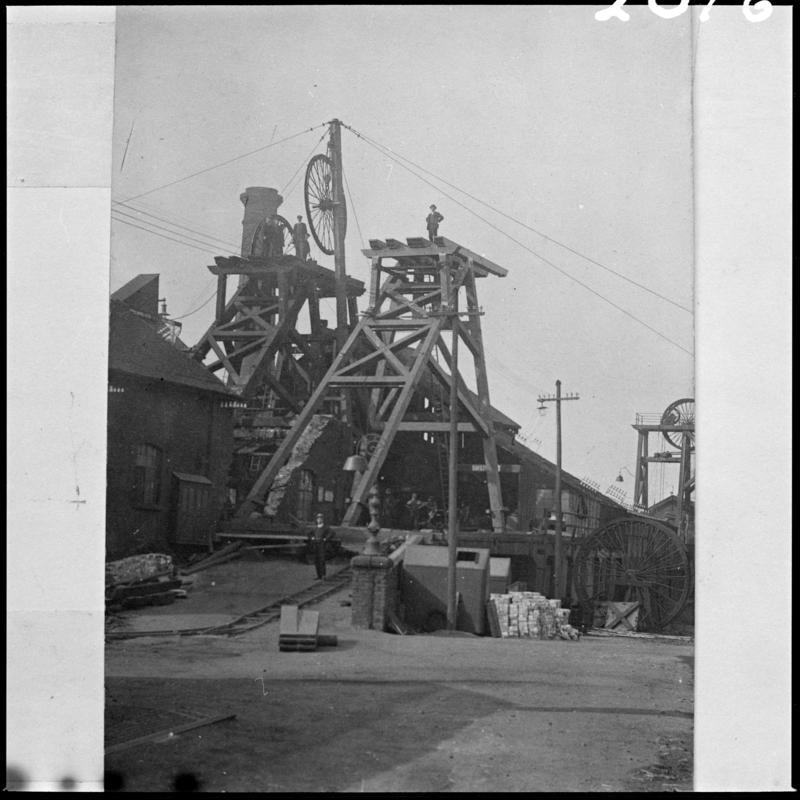 Black and white film negative of a photograph showing a wooden headframe, unknown colliery.  &#039;Wood headframe, unknown pit&#039; is transcribed from original negative bag.