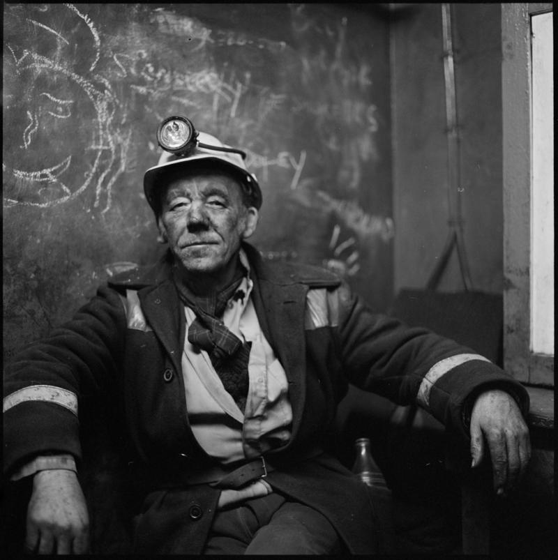 Black and white film negative showing a miner on break, Coegnant Colliery 25 November 1981.  &#039;25 Nov 1981&#039; is transcribed from original negative bag.