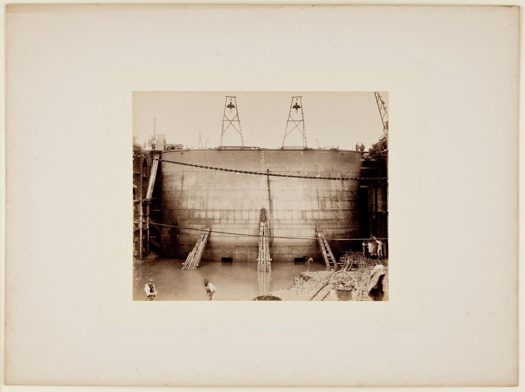 Construction of Barry No. 1 Dock showing coffer dam being used during the fitting of the dock gates. Mounted on card.
