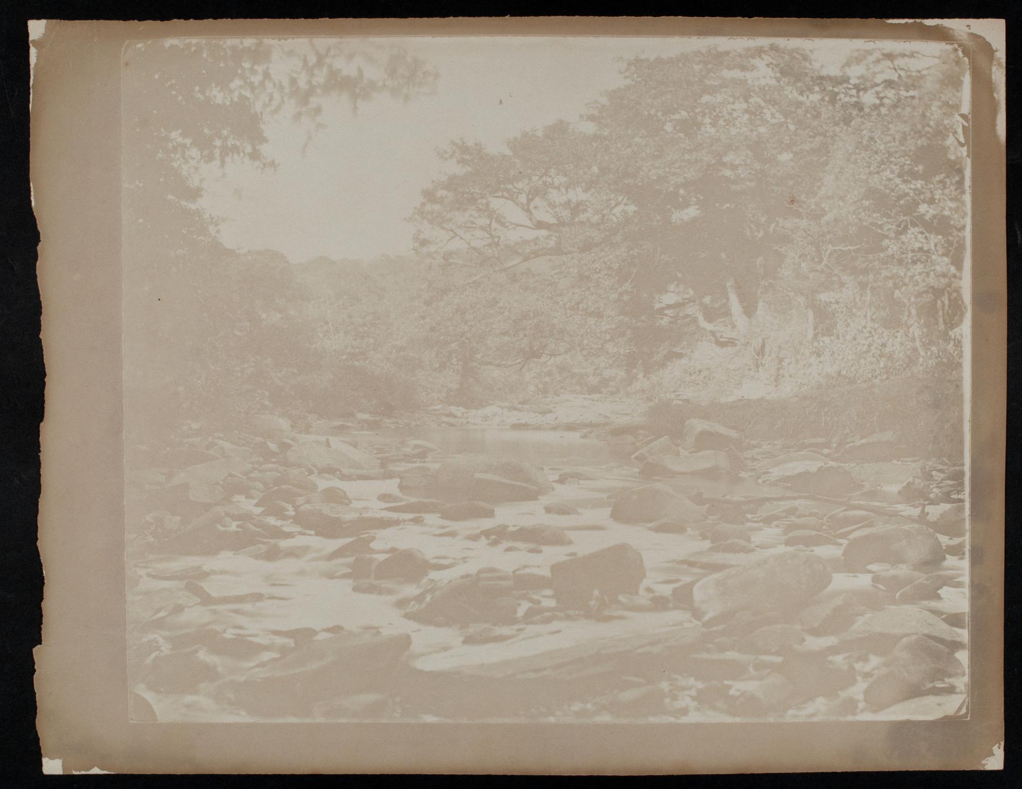 Rock strewn river, photograph