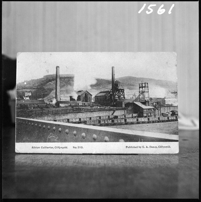 Black and white film negative of a postcard? showing a general surface view of Albion Colliery.  Bottom of postcard reads &#039;Albion Collieries, Cilfynydd&#039;.  &#039;Albion&#039; is transcribed from original negative bag.