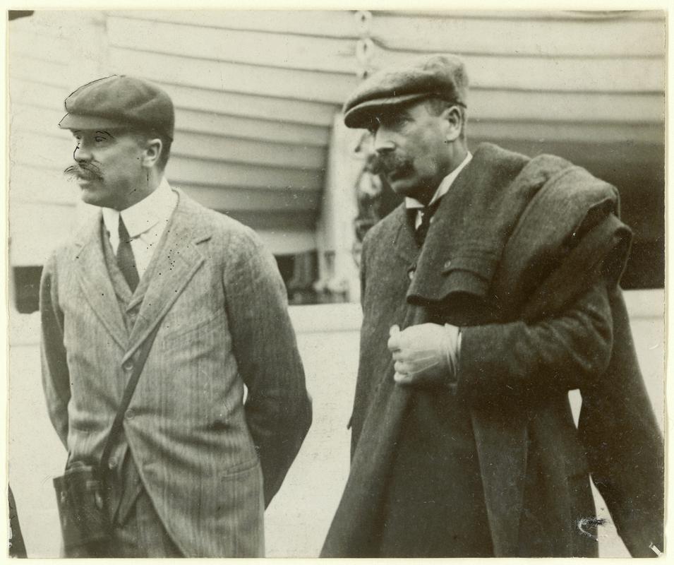 Lord Churchill Chief of the G.W.R. Company and Mr C.I. Churchward Chief Locomotive Superintendent with the R.M.S. LUSITANIA at Fishguard.