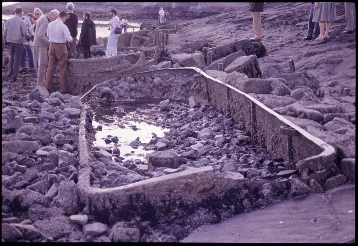 Remains of canal boats on east side of east breakwater at Burry Port Harbour, looking north, 1988.