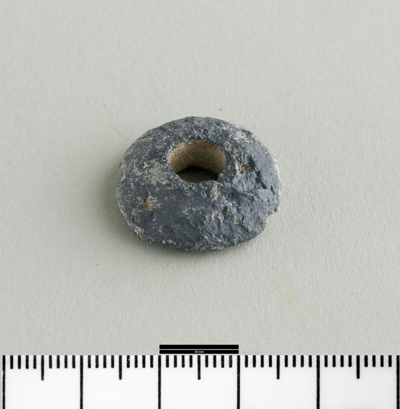 Early Medieval lead spindle whorl