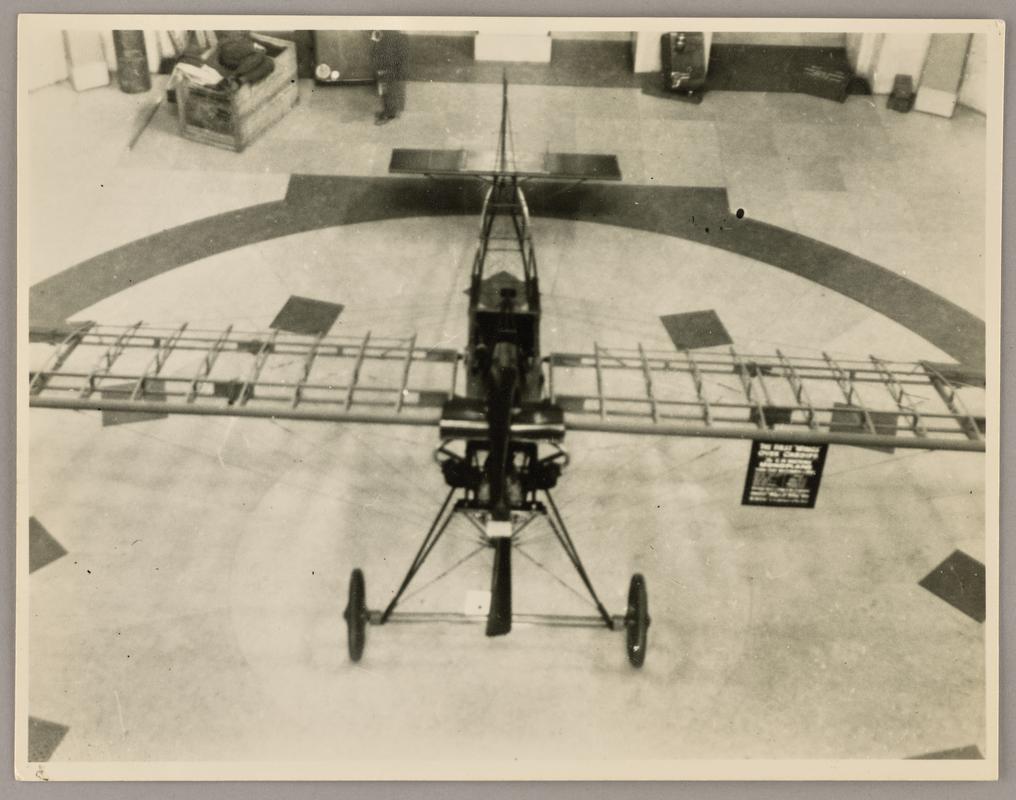 Photograph of Watkins monoplane in the main hall of the National Museum of Wales during the exhibition &#039;Wings for Victory&#039;, 1943.