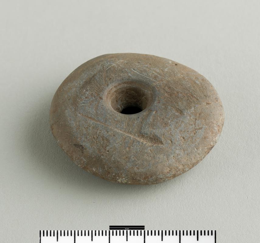 Iron Age / Roman stone spindle whorl