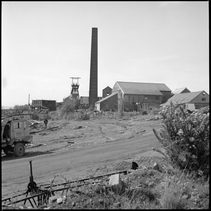 Black and white film negative showing a surface view of Morlais Colliery 13 May 1981.  &#039;Morlais 13/5/81&#039; is transcribed from original negative bag.