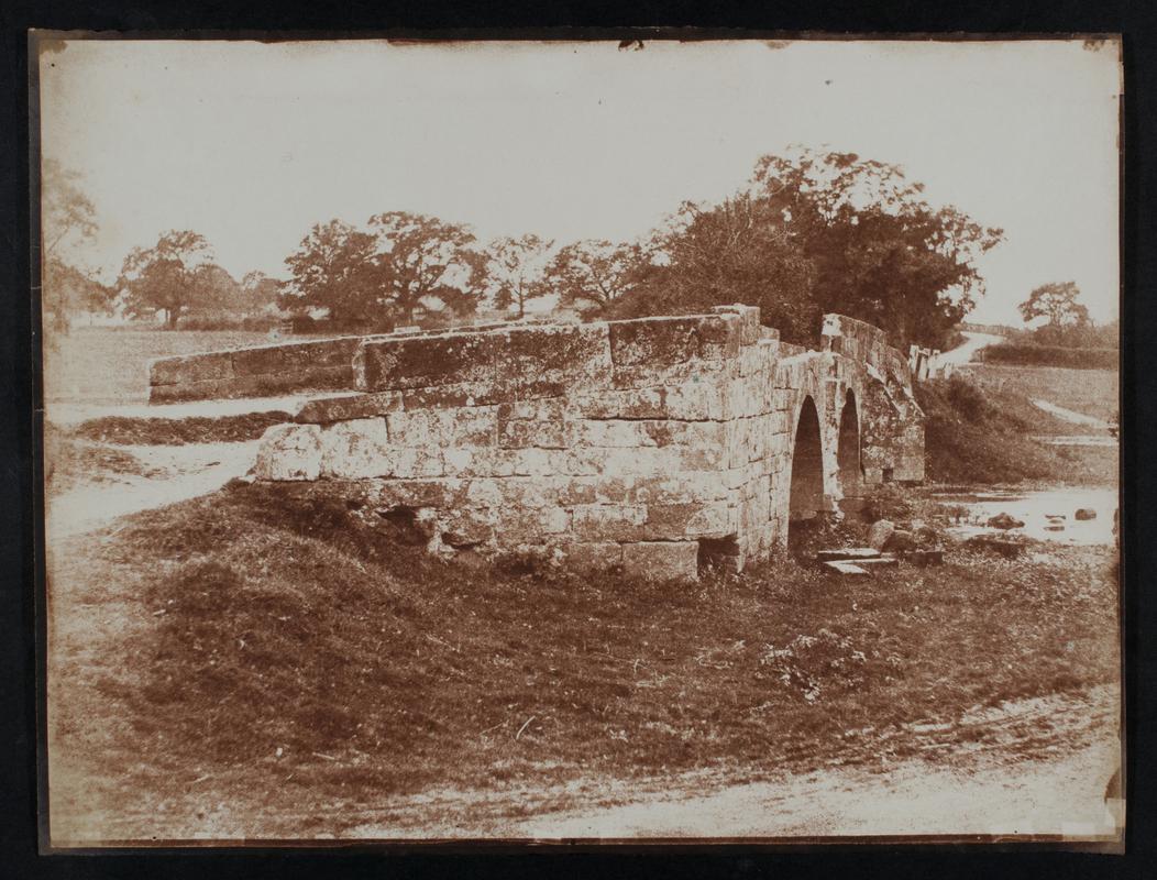 old bridge with damaged parapet