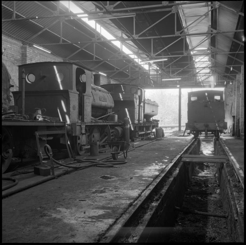 Black and white film negative showing locomotives inside Mountain Ash locomotive shed, Nixon&#039;s Navigation Colliery 19 May 1977.  &#039;19 May 1977&#039; is transcribed from original negative bag.