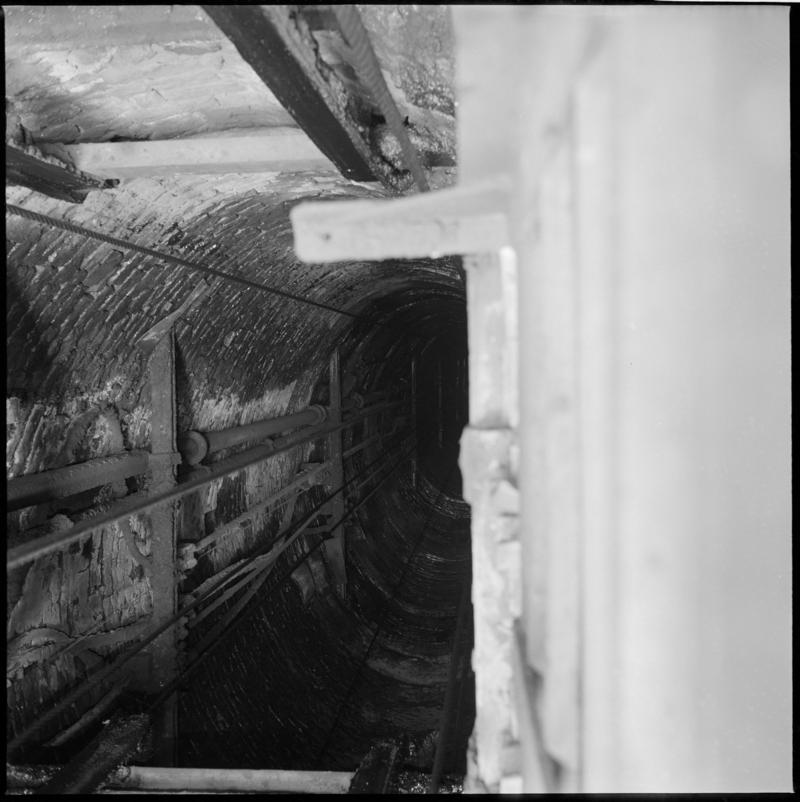 Black and white film negative showing inside the shaft, Big Pit Colliery, 22 August 1975.  &#039;Shaft Blaenavon 22 Aug 1975&#039; is transcribed from original negative bag.