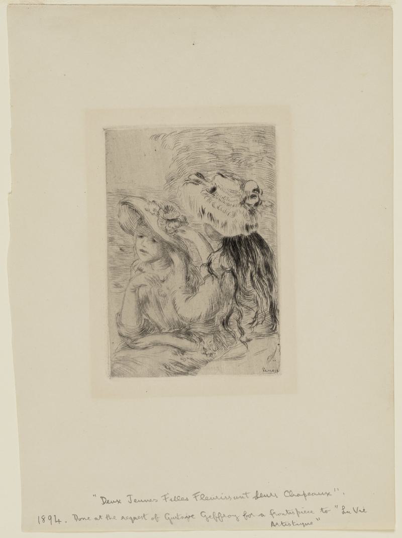 Two young girls pinning flowers on their hats