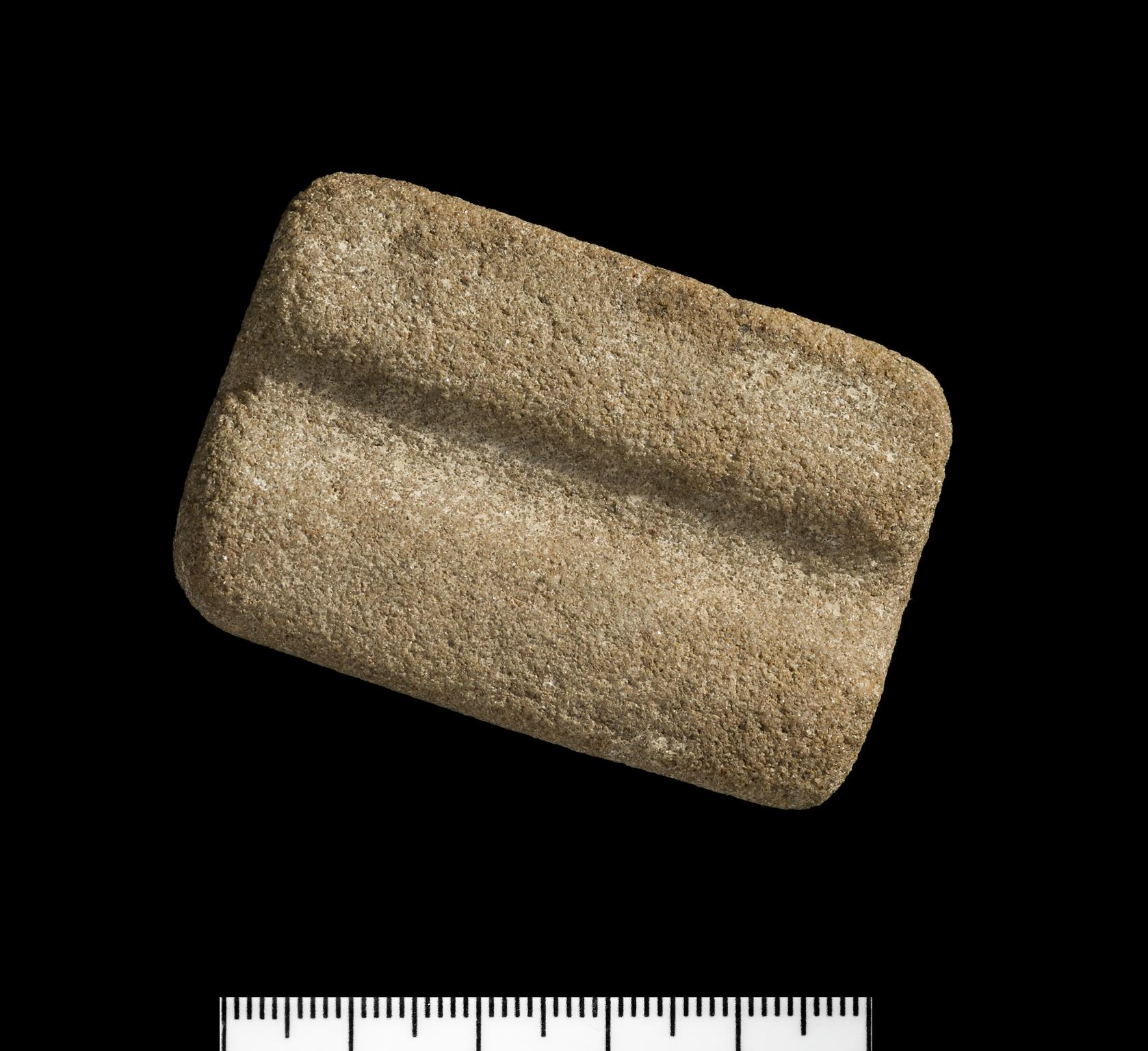 Early Bronze Age stone arrowshaft smoother