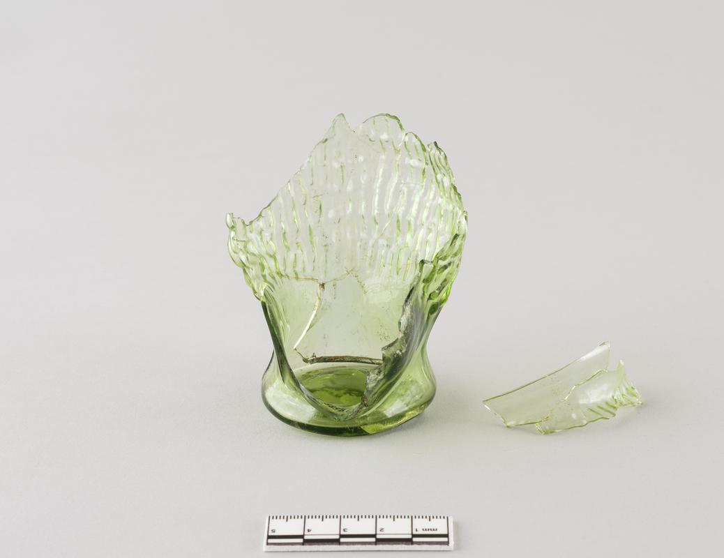 Roman glass negro head beaker