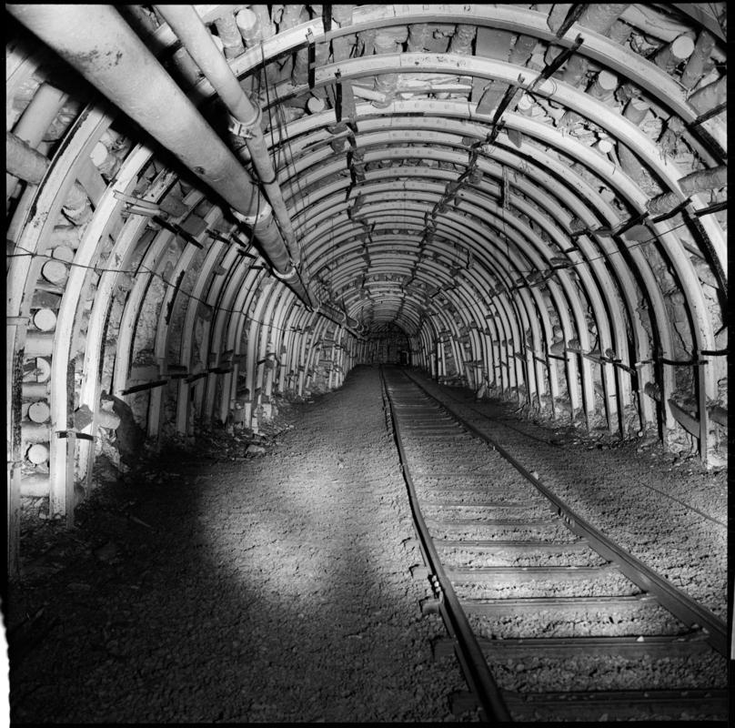 Black and white film negative showing an underground roadway, Cwmtillery Colliery 22 November 1977.  &#039;Cwmtillery, 22 November 1977&#039; is transcribed from original negative bag.