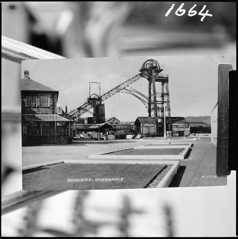Black and white film negative showing a photograph of downcast and upcast headframes, Deep Navigation Colliery, Treharris.