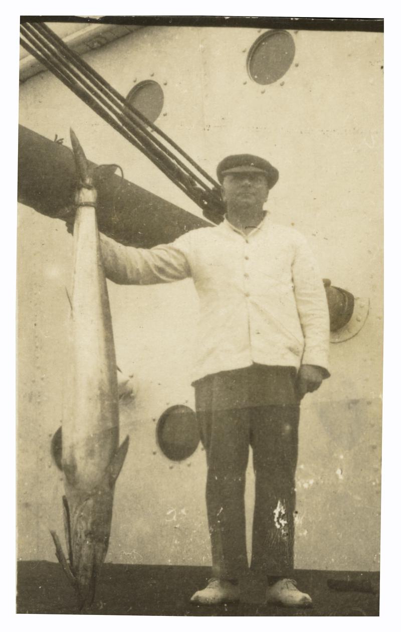 Capt. J.R. Jenkins, of Aberporth, off the Brazilian coast holding a barracuda