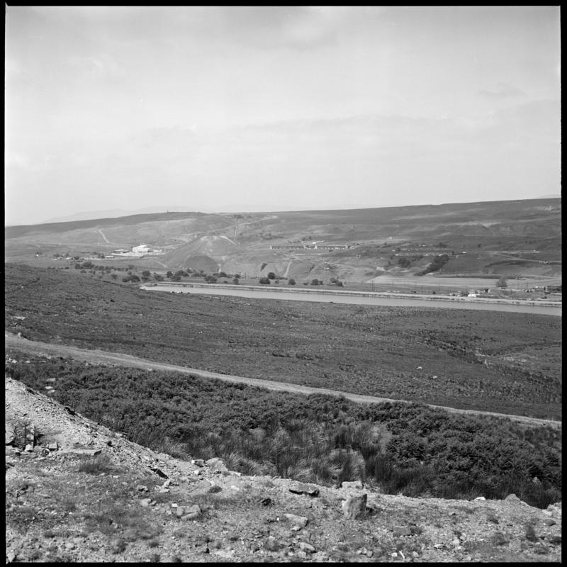 Black and white film negative showing the site of the washery tip, Big Pit Colliery.  &#039;site of washery tip, Blaenavon&#039; is transcribed from original negative bag.