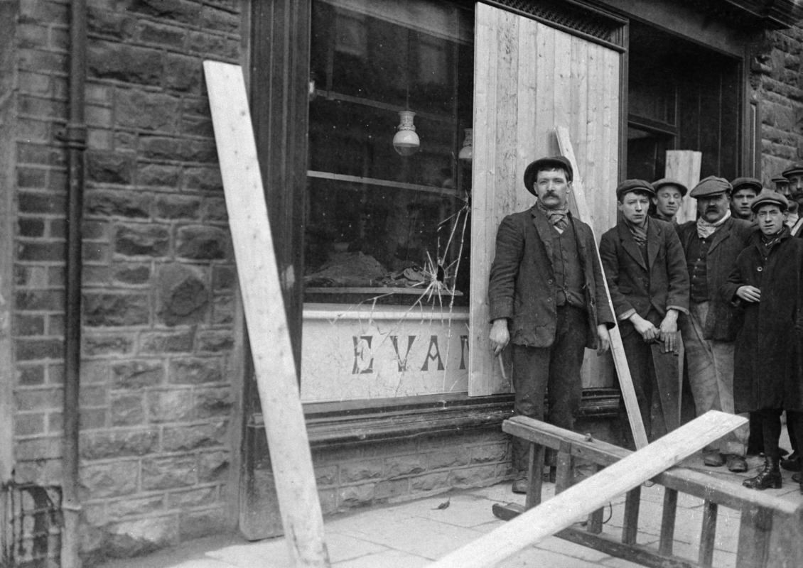 Cambrian Combine Strike. A butcher&#039;s smashed windows after the riot in Blaenclydach