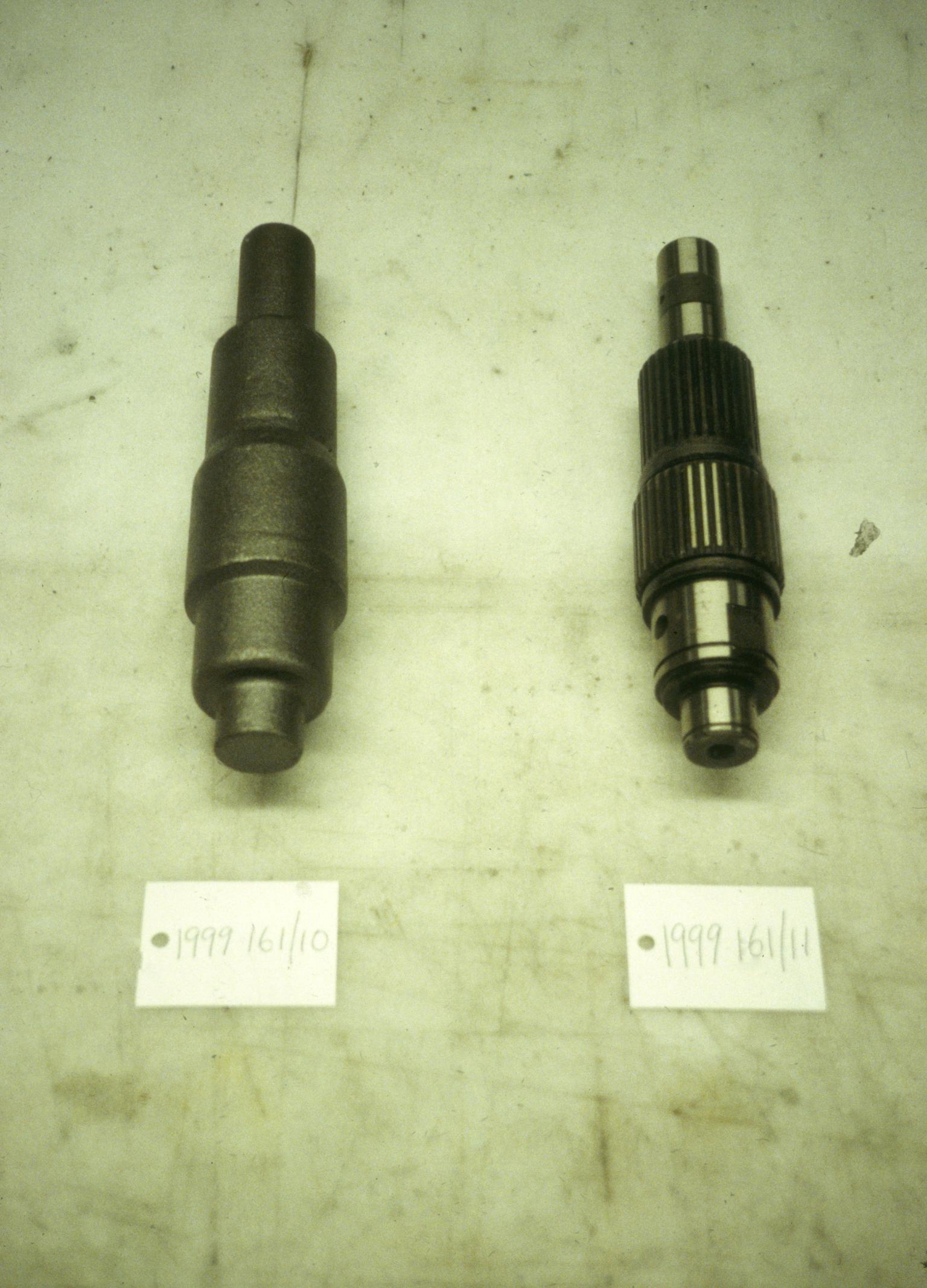 Two unidentified car components
