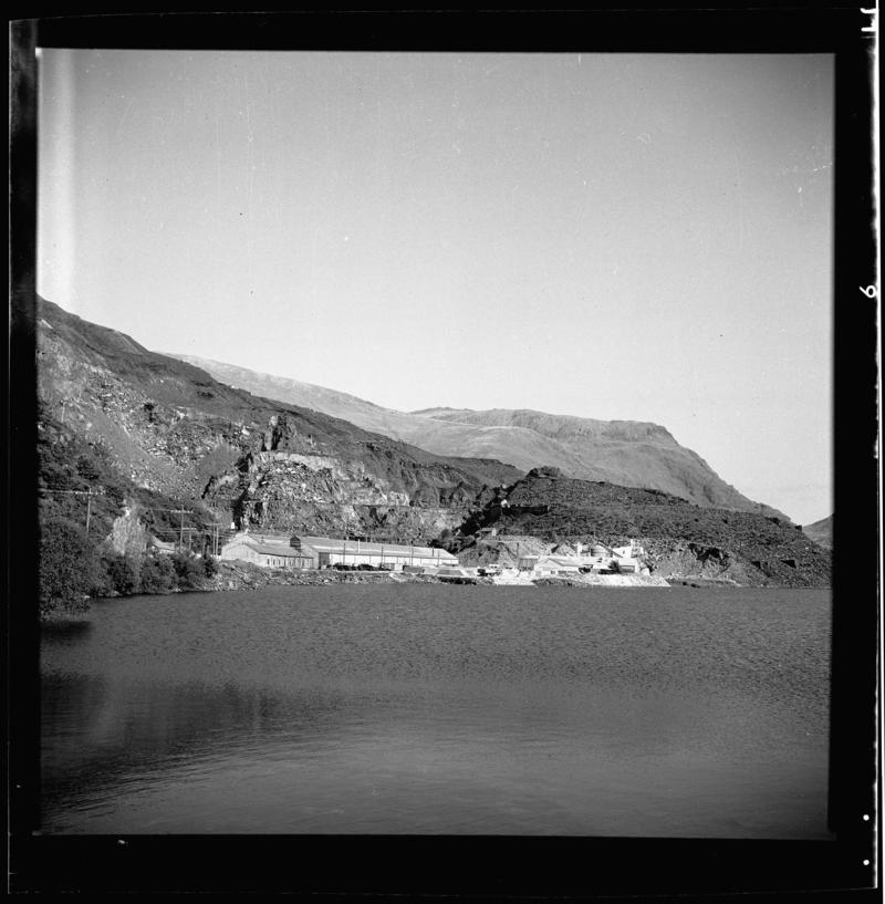 General view of Dinorwig Quarry, 1950.

Image shows the &#039;Wellington&#039; section of Dinorwig Quarry, with the Muriau Shed in the foreground, and the Ceiliog Mawr in the background.  Photograph taken from &#039;Pont Bala&#039;.