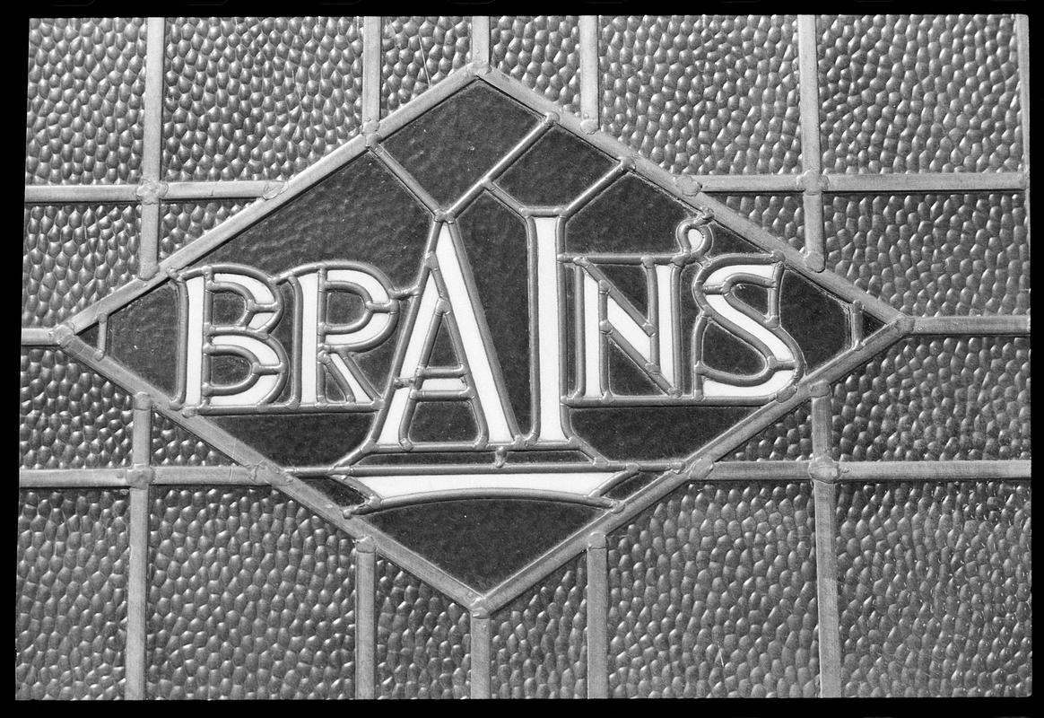 Brain&#039;s Brewery sign, in glass window of &quot;The Packet&quot;.