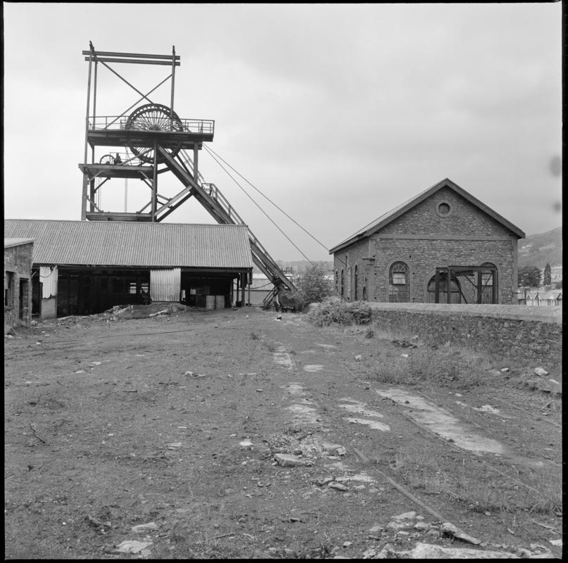 Black and white film negative showing the headframe and engine house of the South Pit, Nixon&#039;s Navigation Colliery 1975.  &#039;Mountain Ash 1975&#039; is transcribed from original negative bag.