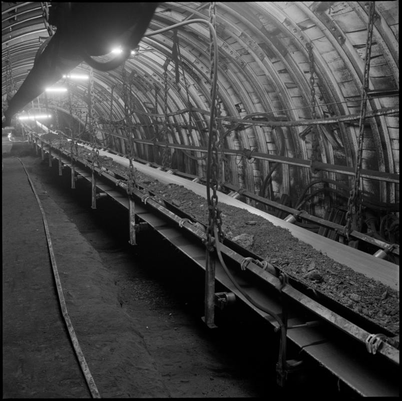 Black and white film negative showing a conveyor underground at Celynen North Colliery, 1978-9.  &#039;Celynen North 1978-9&#039; is transcribed from original negative bag.