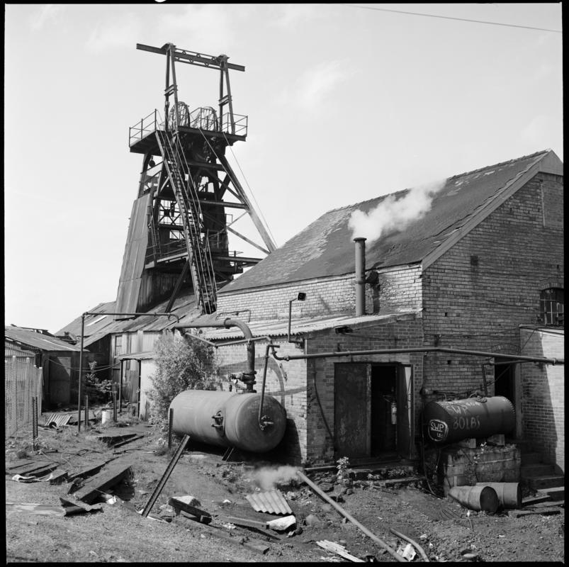 Black and white film negative showing a view of the headgear, Morlais Colliery 13 May 1981.  &#039;Morlais 13/5/81&#039; is transcribed from original negative bag.