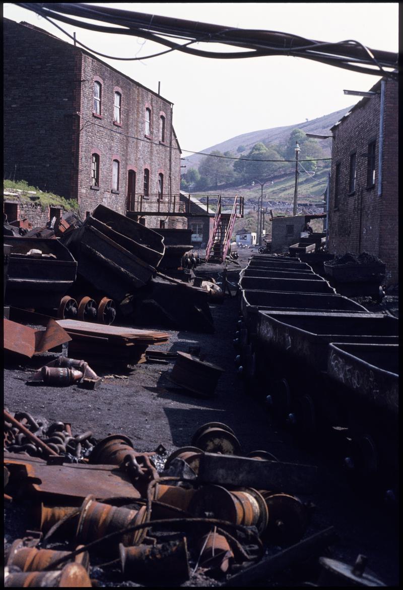 Colour film slide showing Graig Merthyr Colliery yard and a long journey of drams.