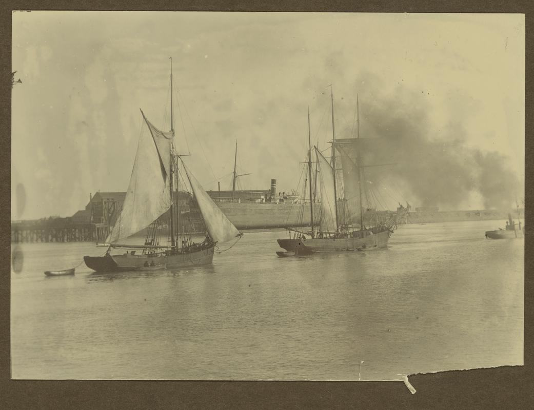 Vessels in the Cardiff docks channel to the sea, c.1890.