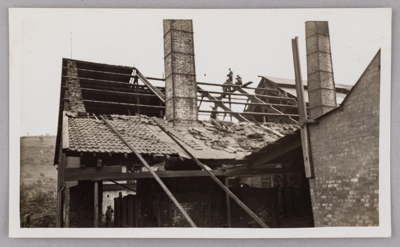 Replacing damaged pantile roof of north end of hot mills building at Bryn Tinplate Works, Ynysmeudwy, June 1935.