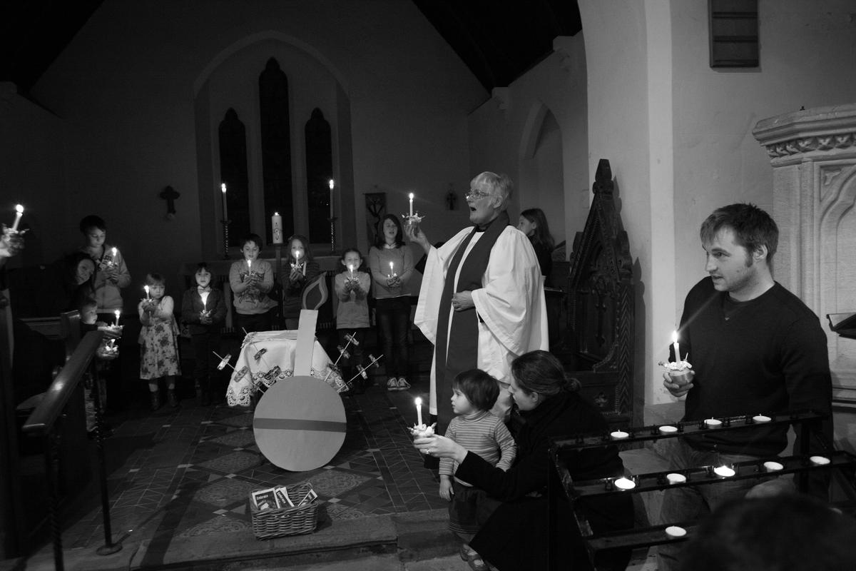 GB. WALES. Tintern. Christingle Service in St Michael&#039;s church. 2012.