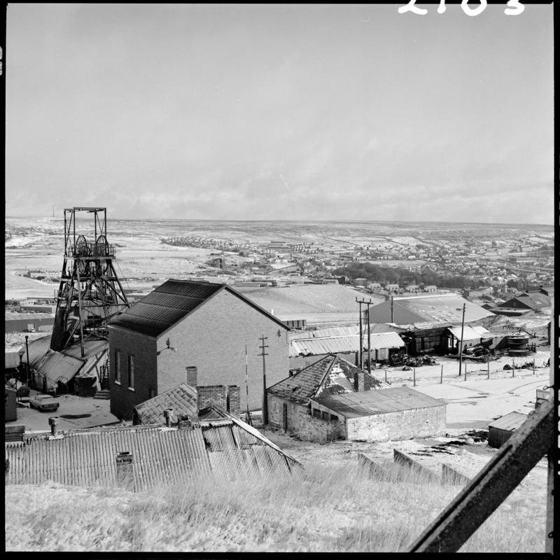 Black and white film negative showing a surface view of Big Pit Colliery, taken from the pit head baths, 28 November 1980.  &#039;Blaenavon 28/11/80&#039; is transcribed from original negative bag.