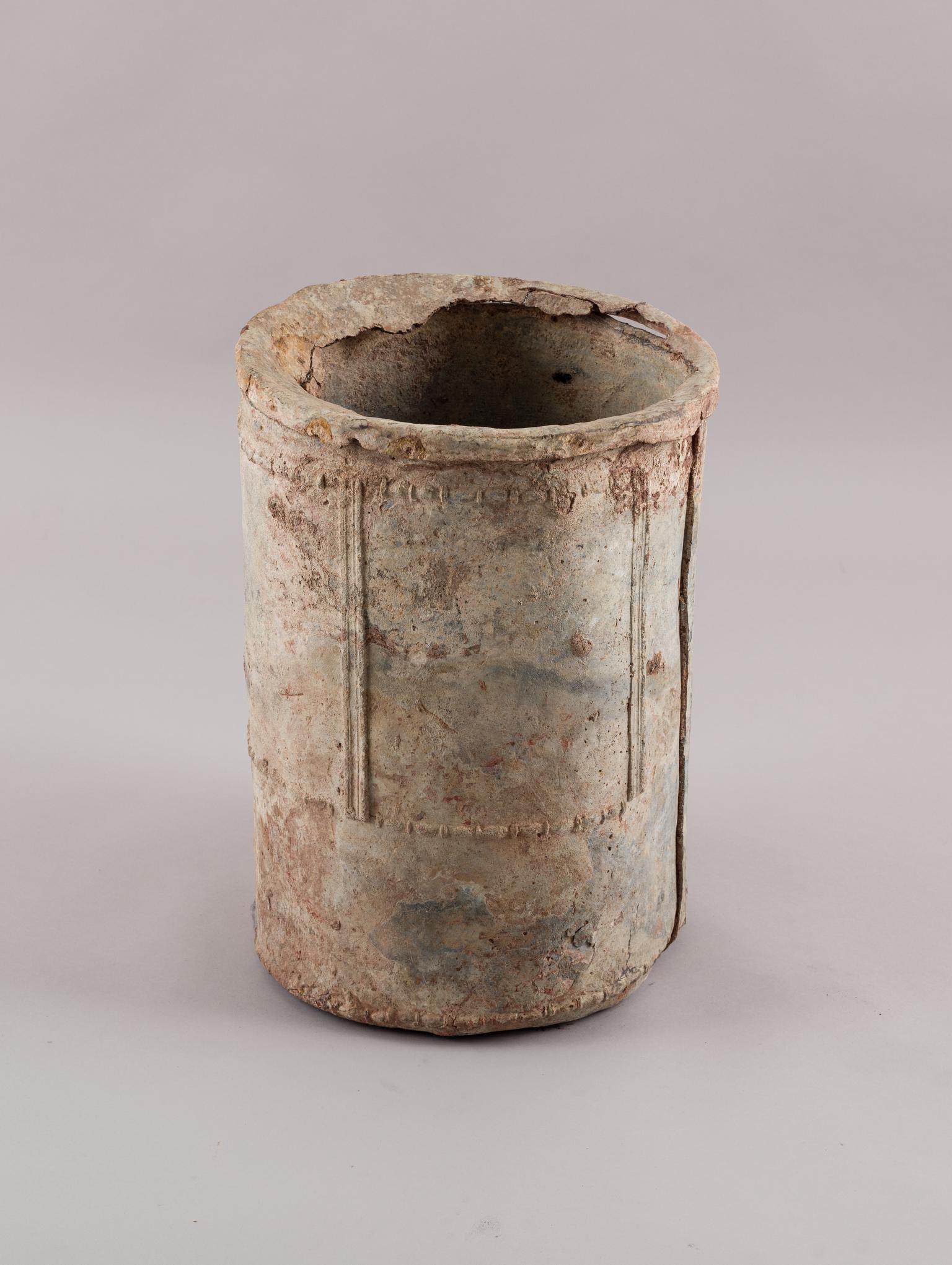 Roman lead canister from pipe burial
