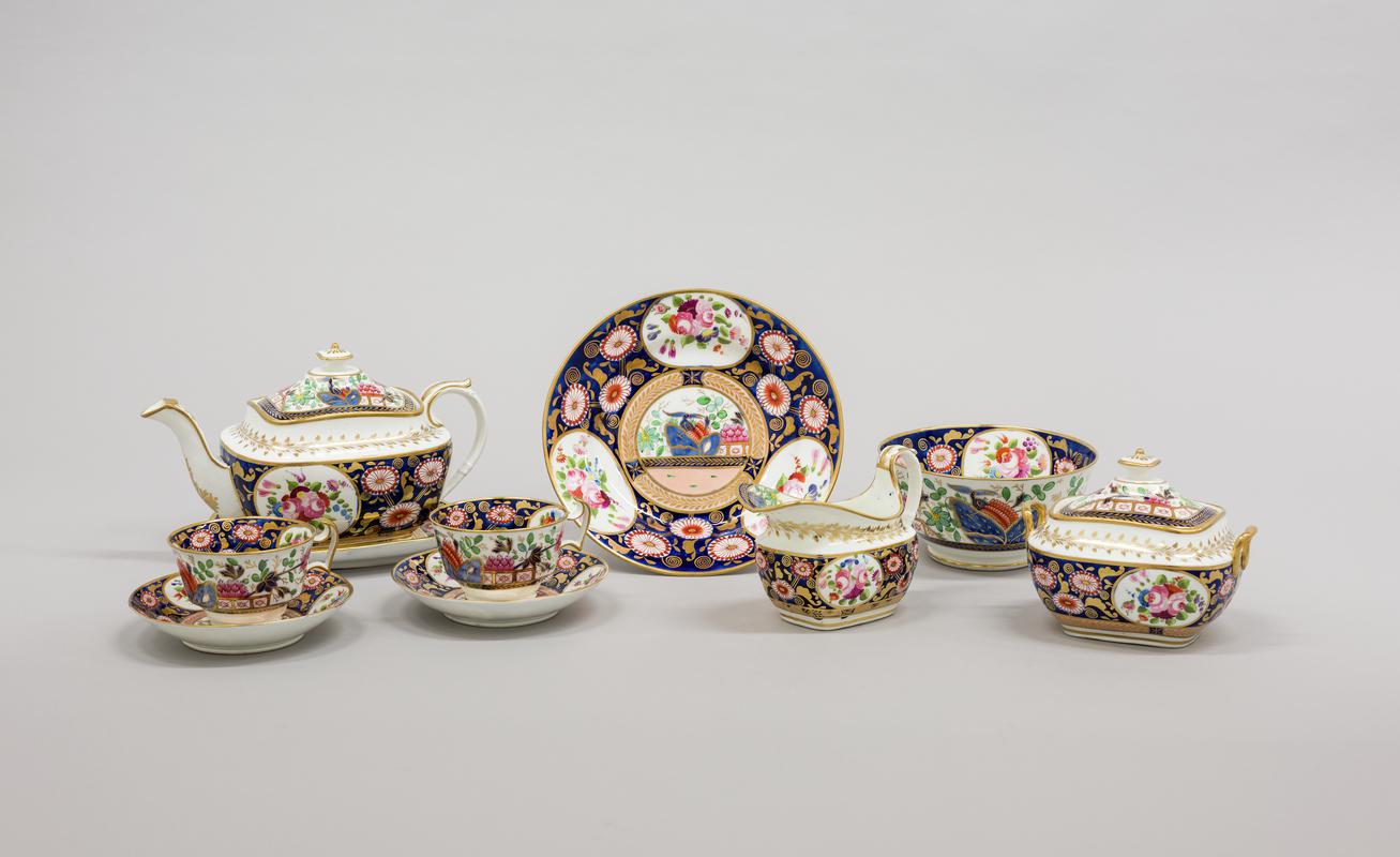 porcelain teapot &amp; stand, porcelain cream jug, porcelain slop bowl, porcelain sugar box &amp; cover, porcelain plate, 2 x porcelain cup &amp; saucer - Group shot