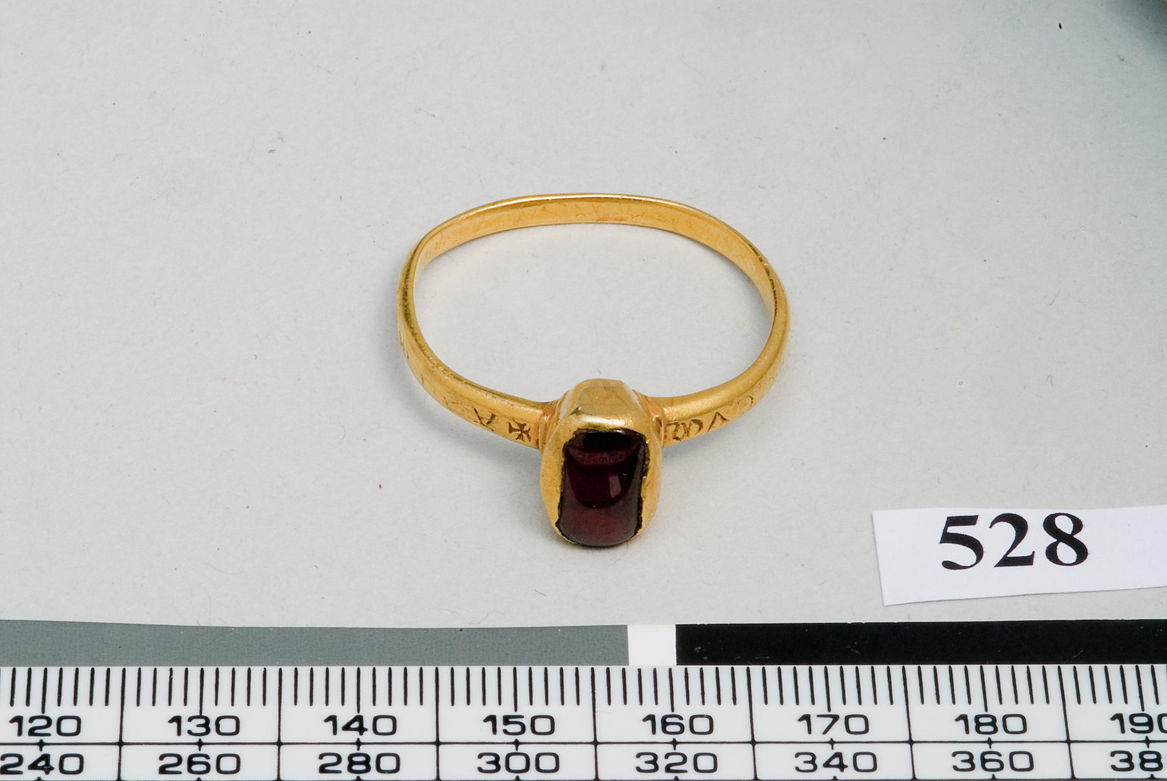 Medieval gold ring with garnet
