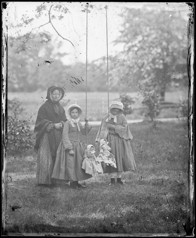 Dolls in Swing (glass negative)