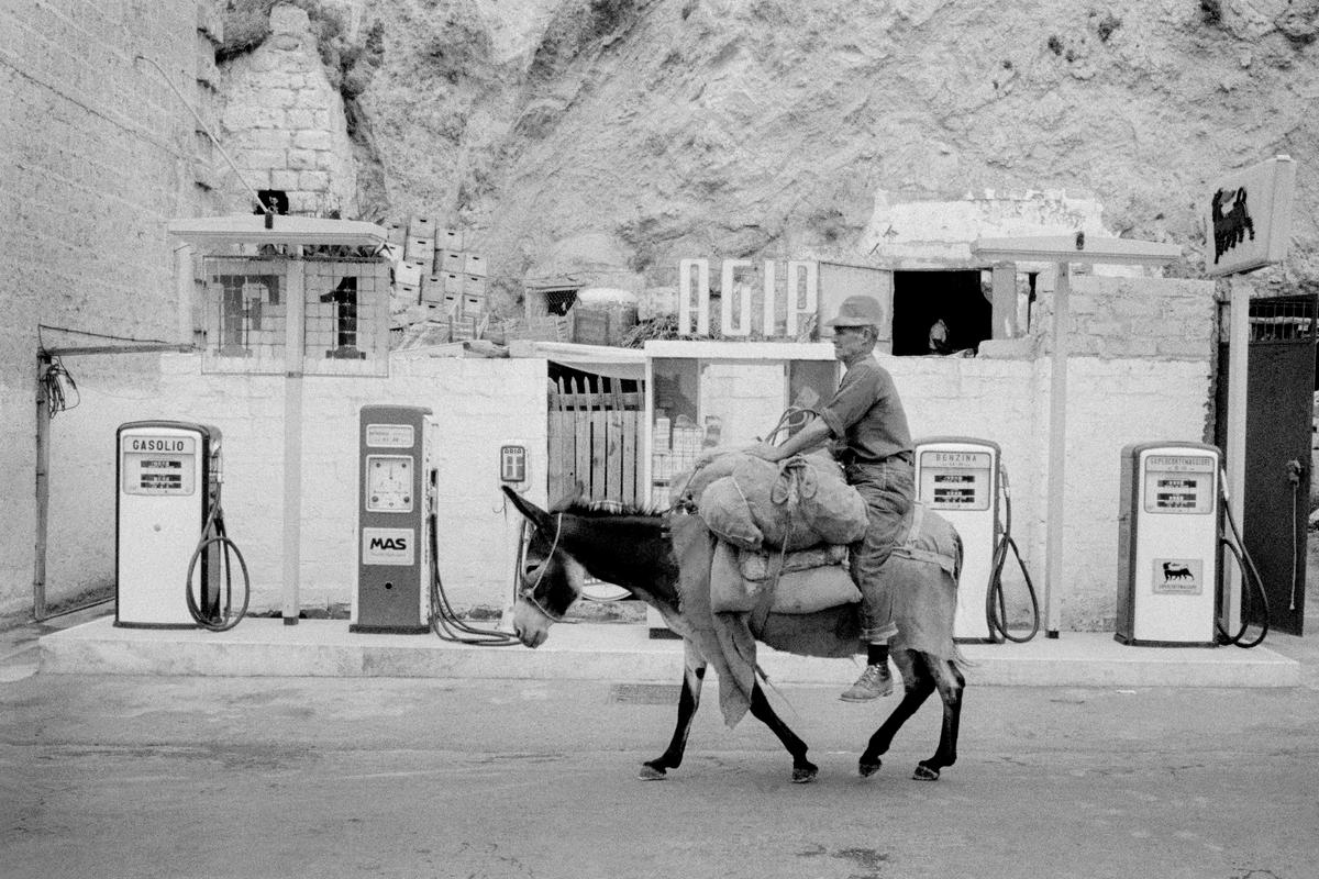 ITALY. Ponza. Donkey v petrol contrasts in transport. 1964.
