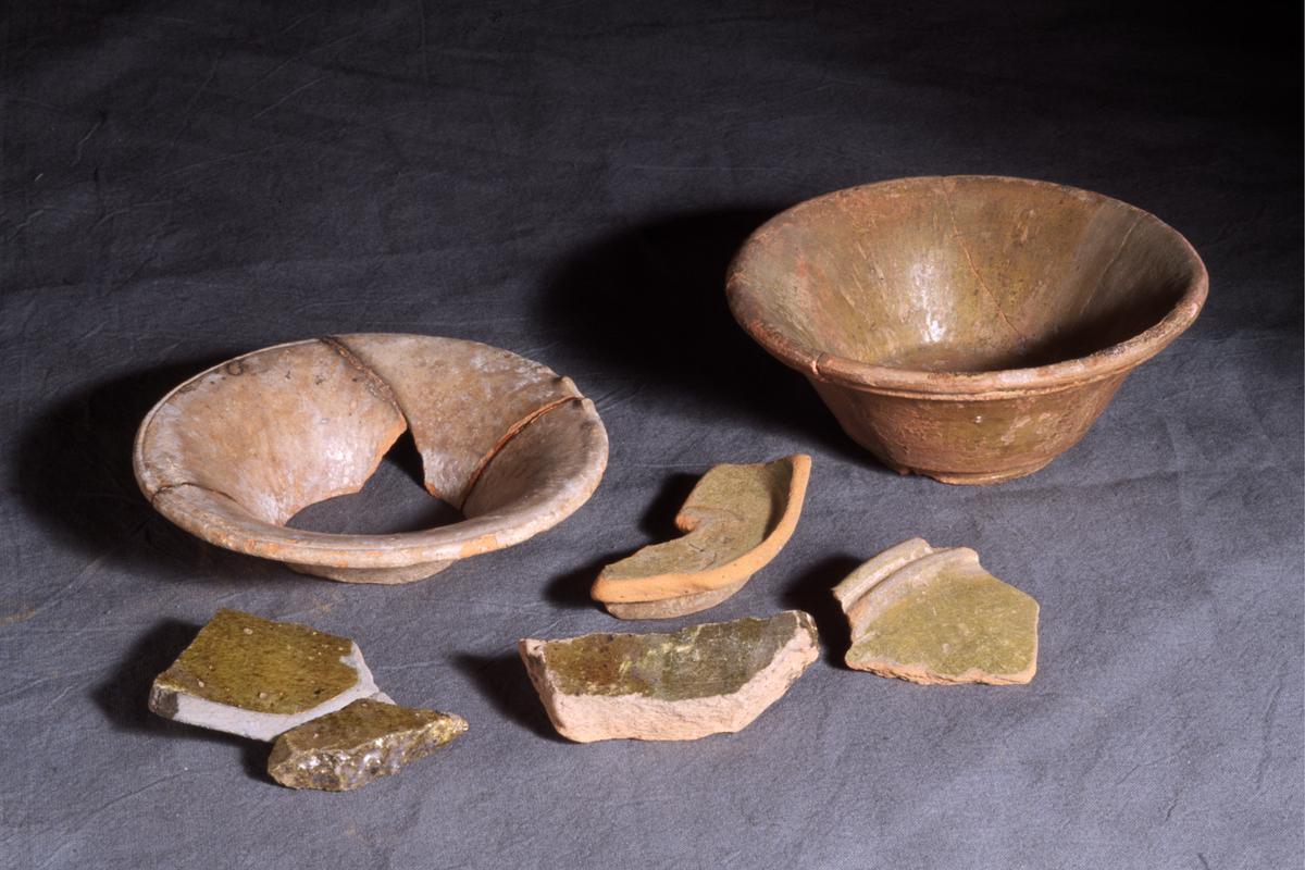 green glazed pottery vessals accompanied by sherds